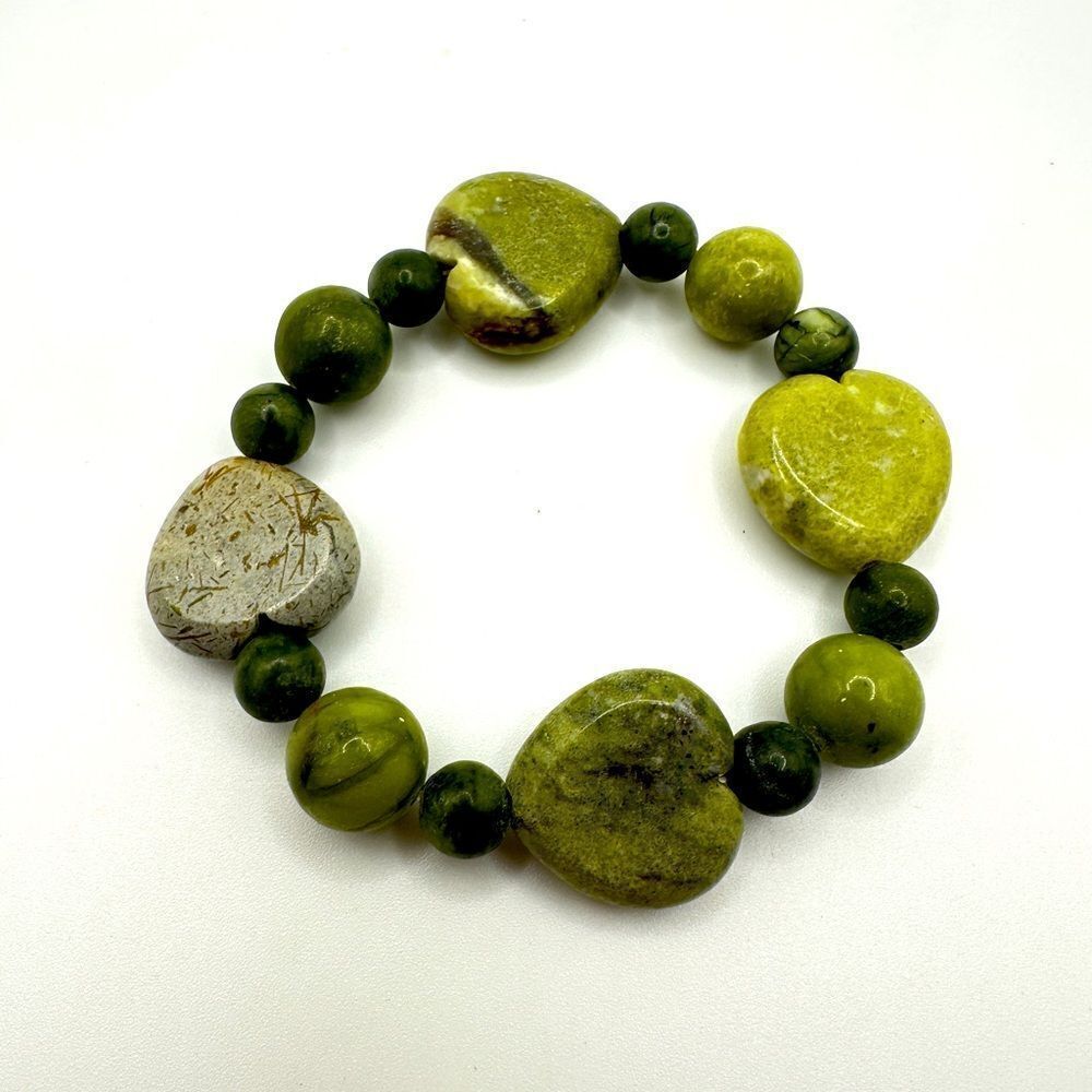 SALE! Genuine Connemara irish marble, carved heart stone stretch bracelet!‎